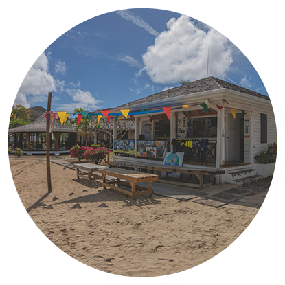 A picture of a beach hut with flags on it, near the Grenada snorkeling area. A picture of a beach hut with flags on it, near the Grenada snorkeling area.
