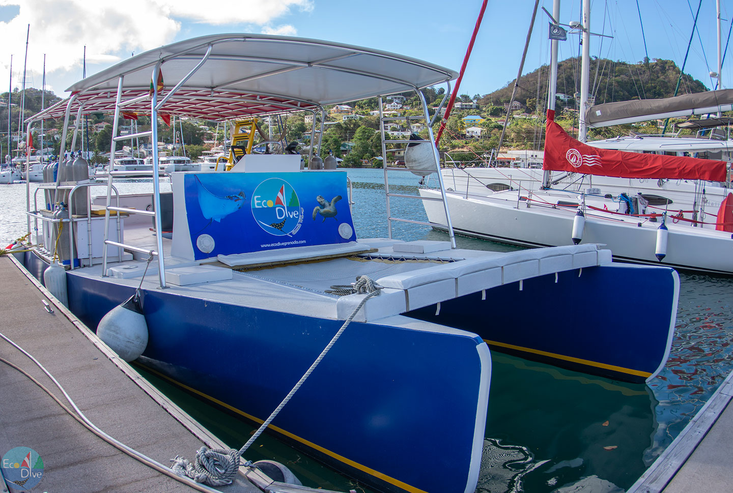 A boat docked near the Grenada underwater sculpture park. A boat docked near the Grenada underwater sculpture park.